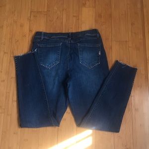 Hand embellished and distressed jeans